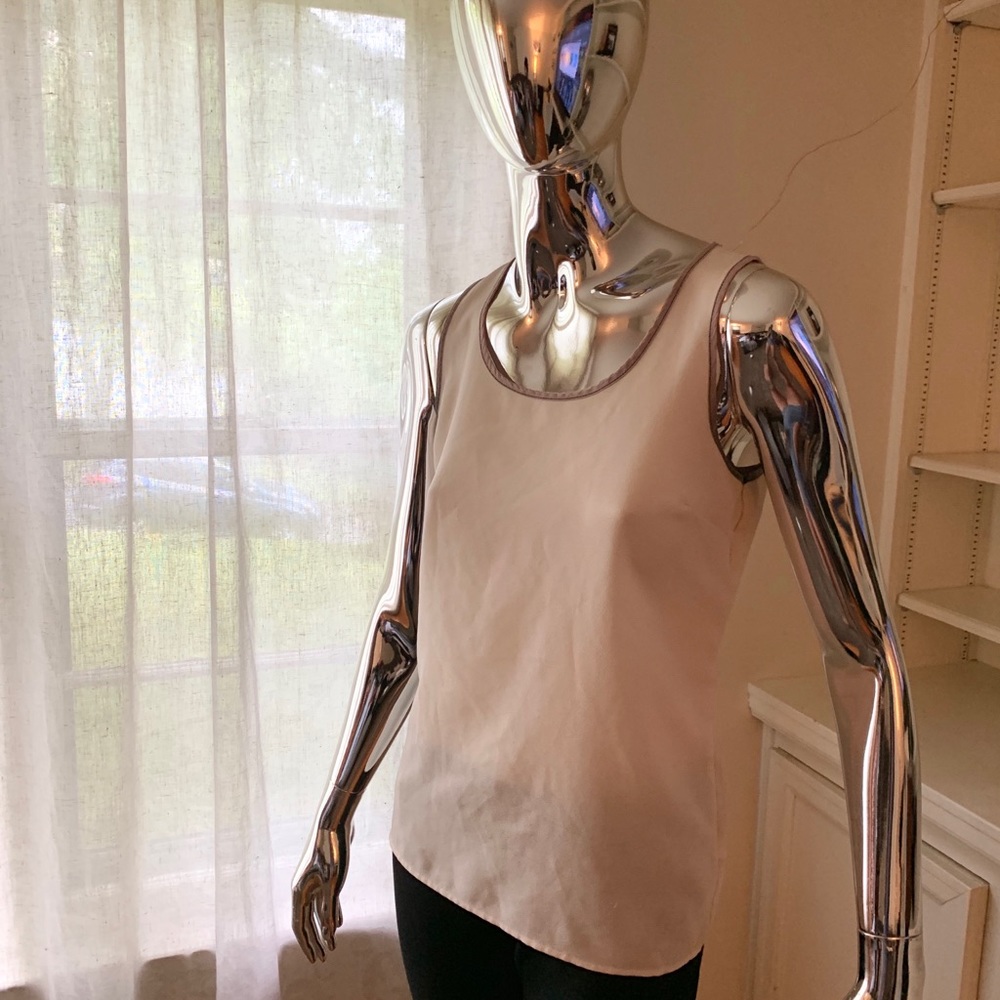 White sleeveless top